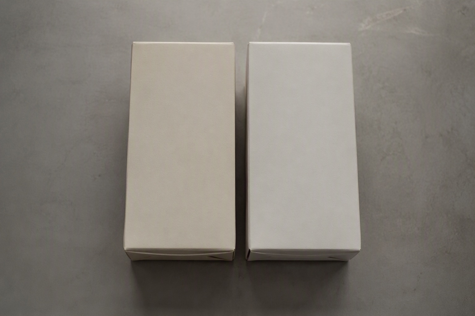 Two visually similar product cartons side by side for image-based authenticity comparison